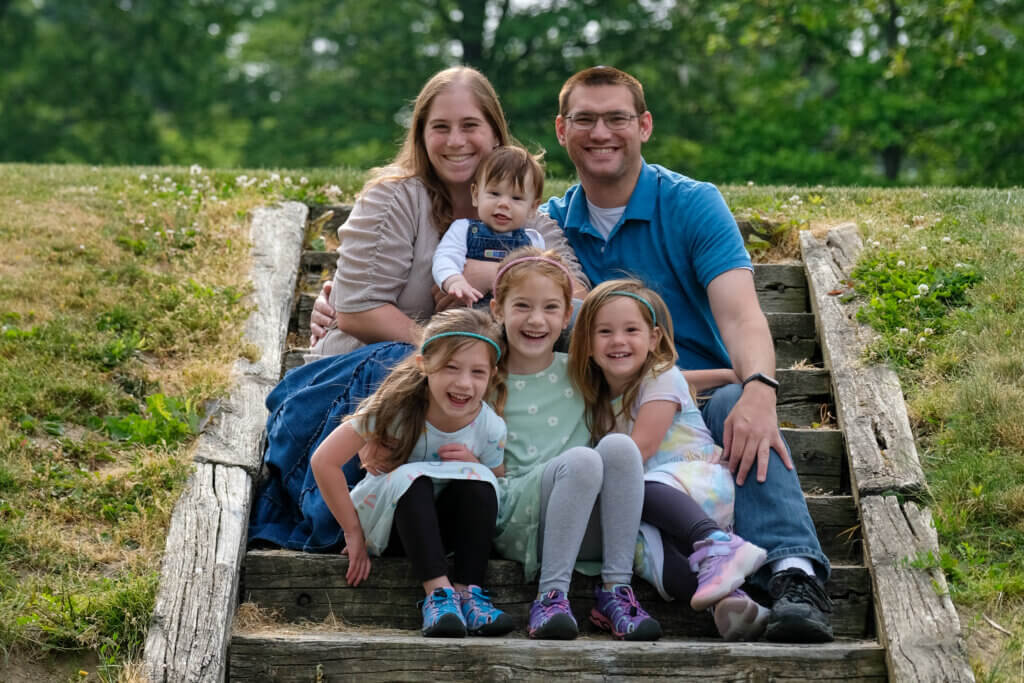 Family sitting on steps